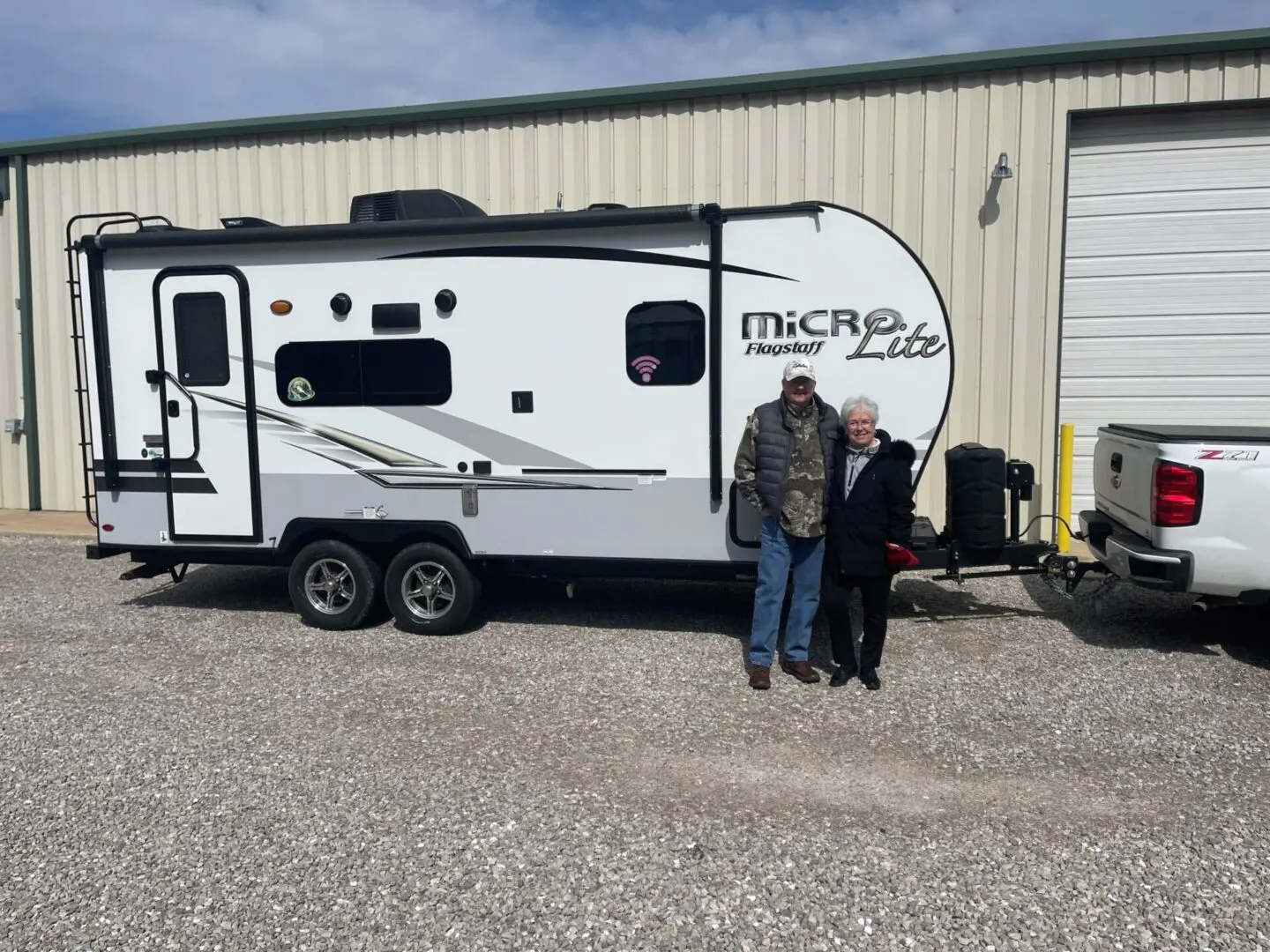 RV parked outside garage
