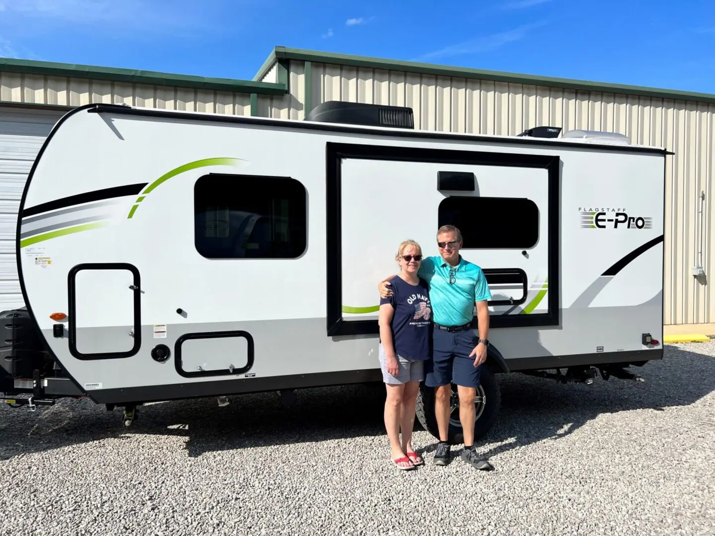 Happy pair with their new camper